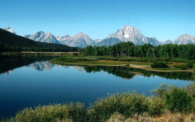 Looking at beautiful things, like photos of the Grand Teton Mountains in Wyoming, is an effective way to full your energy bucket. 